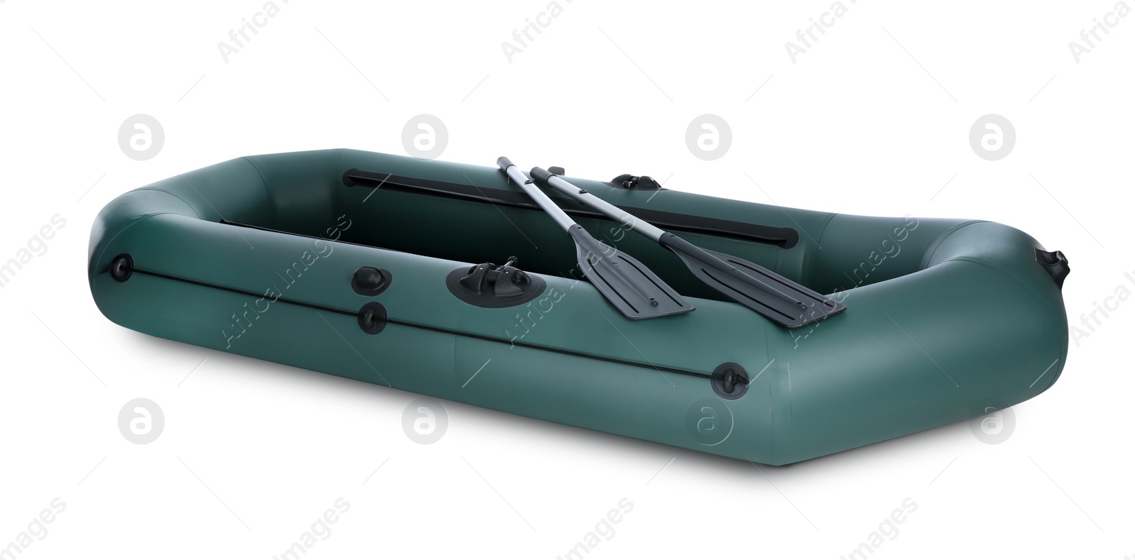 Photo of Inflatable rubber fishing boat with aluminium oars isolated on white