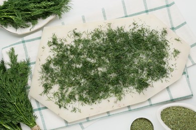 Fresh dill preparing for drying on white table, flat lay