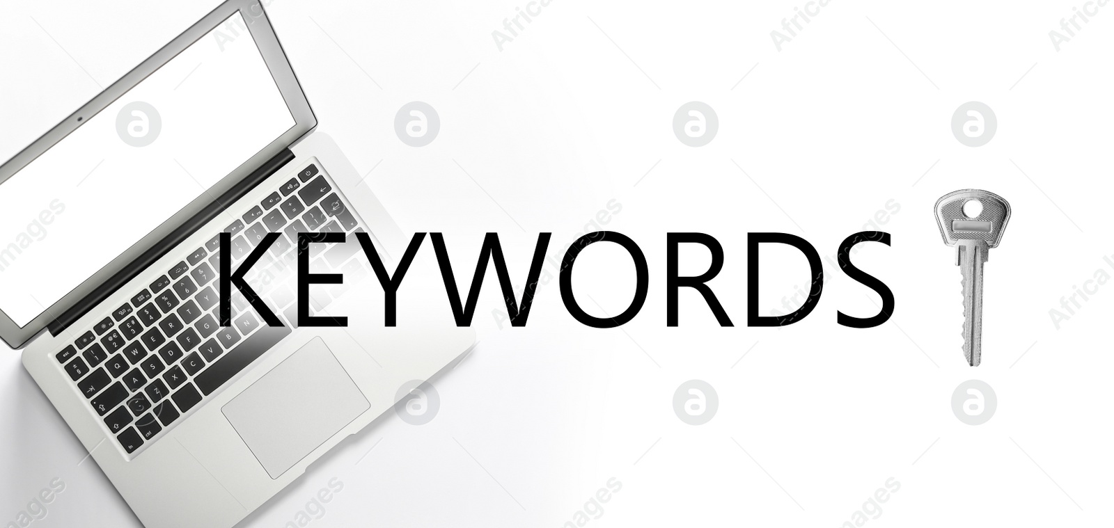 Image of Word Keywords, laptop and key on white background, top view. SEO direction