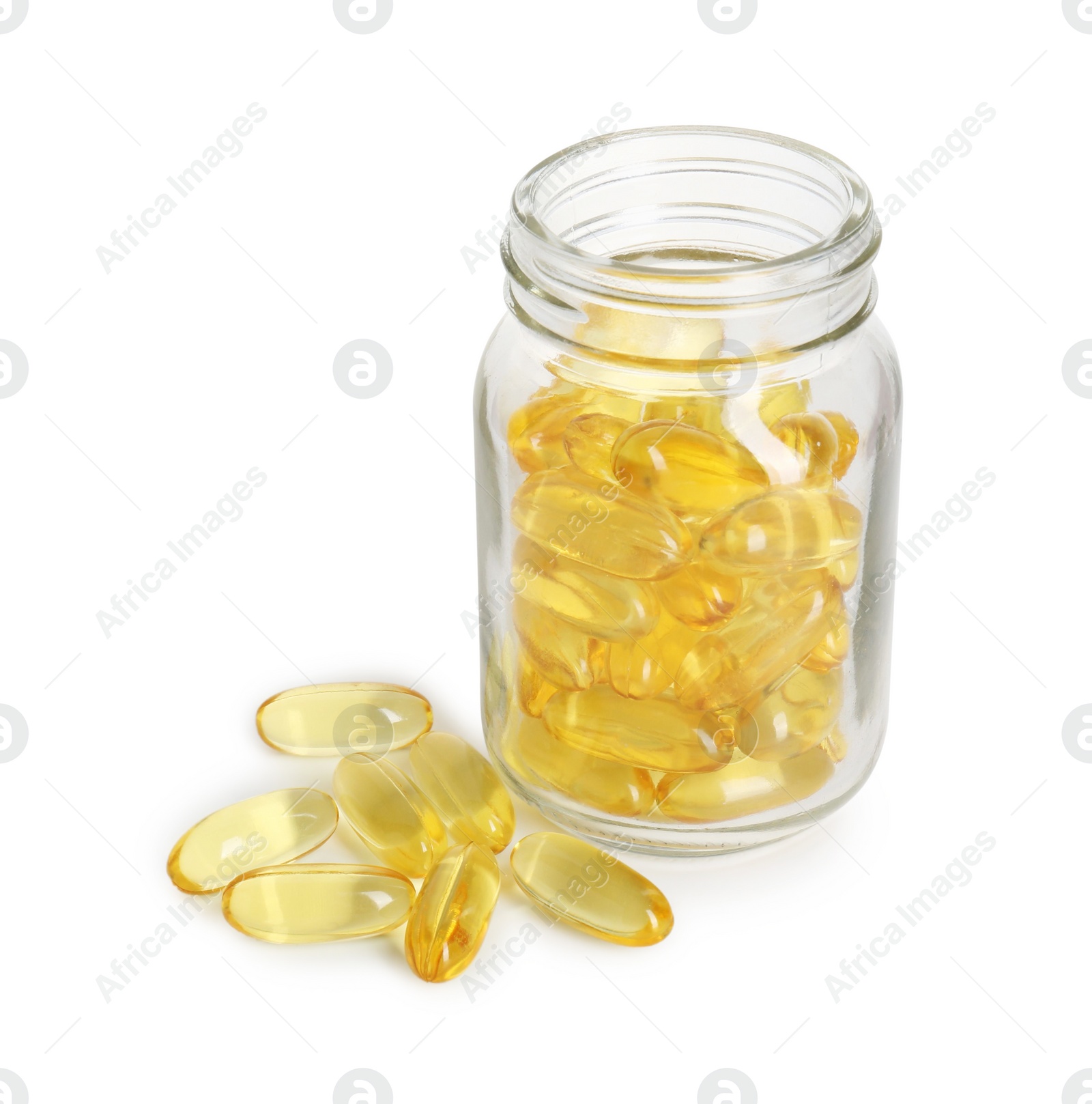 Photo of Bottle and pile of softgel capsules isolated on white