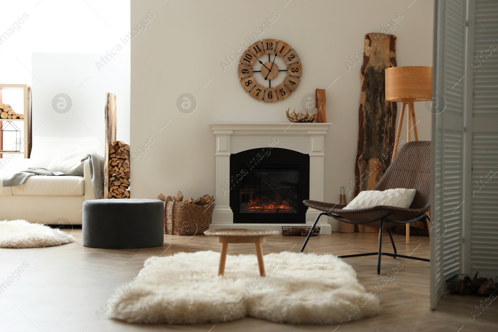 Photo of Beautiful view of cozy living room interior with modern fireplace