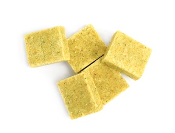 Photo of Bouillon cubes on white background, top view