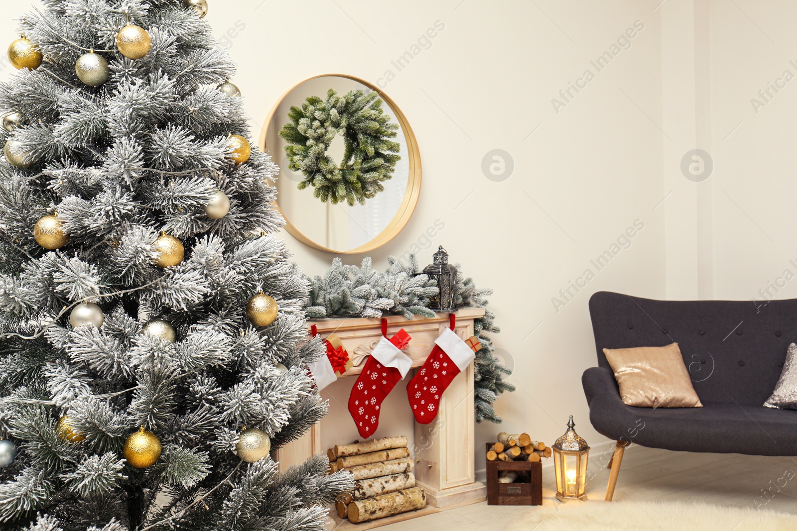 Photo of Stylish Christmas interior with decorated fir tree and fireplace