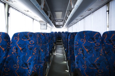 View of bus interior with comfortable seats