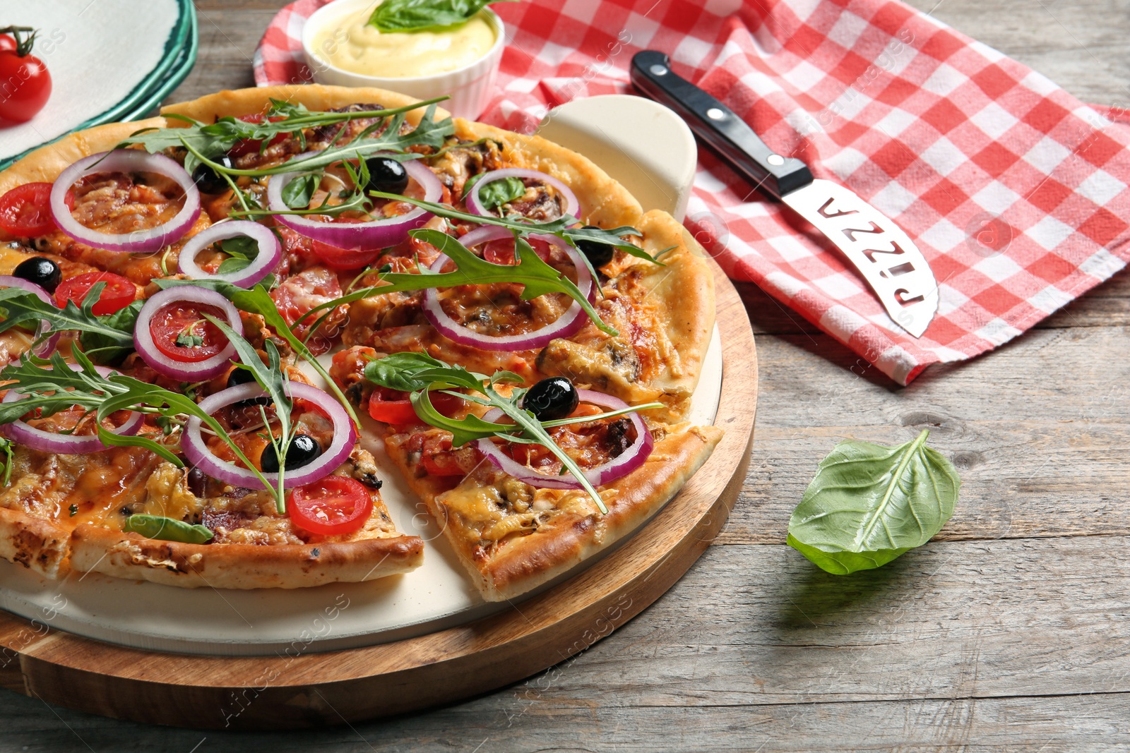 Photo of Tasty fresh homemade pizza on wooden table