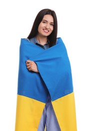 Young woman with flag of Ukraine on white background