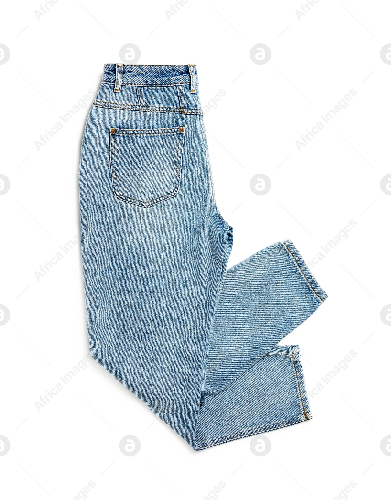 Photo of Modern women's jeans isolated on white, top view