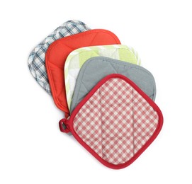 Oven potholders for hot dishes on white background, top view
