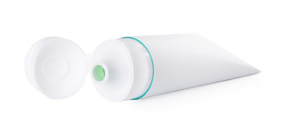 Photo of Blank tube of toothpaste isolated on white