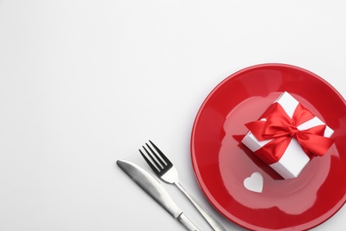 Photo of Beautiful table setting on white background, flat lay with space for text. Valentine's Day dinner