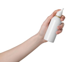 Woman holding nasal spray on white background, closeup