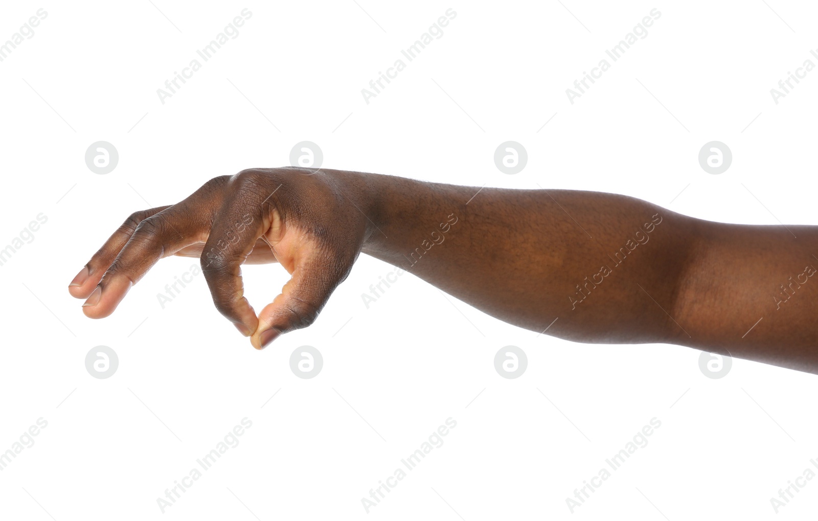 Photo of African-American man holding something in hand on white background, closeup