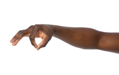 African-American man holding something in hand on white background, closeup