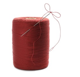 Photo of Red sewing thread with needle on white background