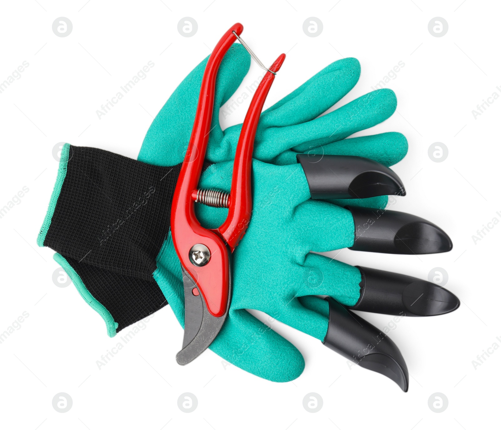 Photo of Pair of claw gardening gloves and secateurs isolated on white, top view