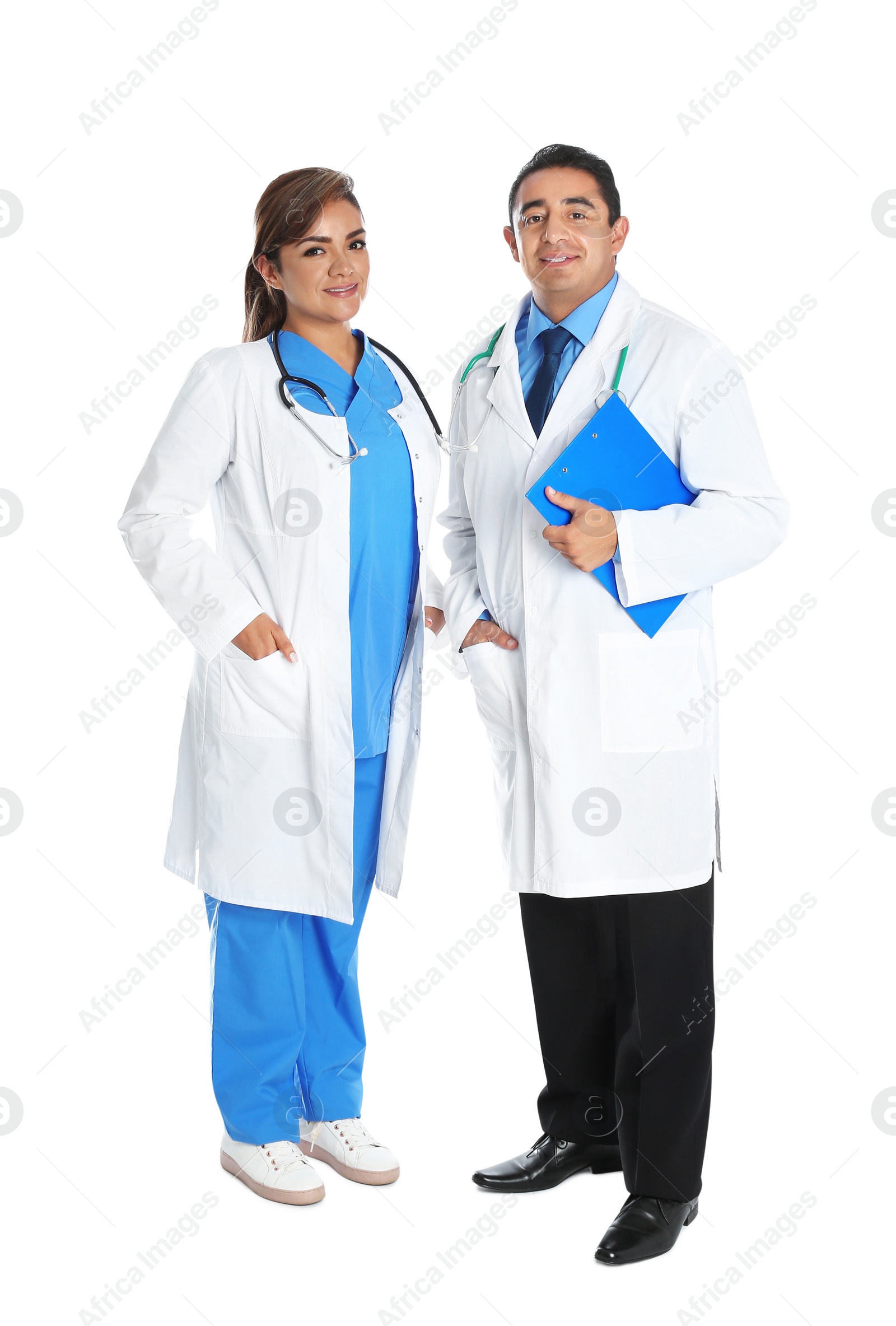 Photo of Full length portrait of Hispanic doctors isolated on white. Medical staff