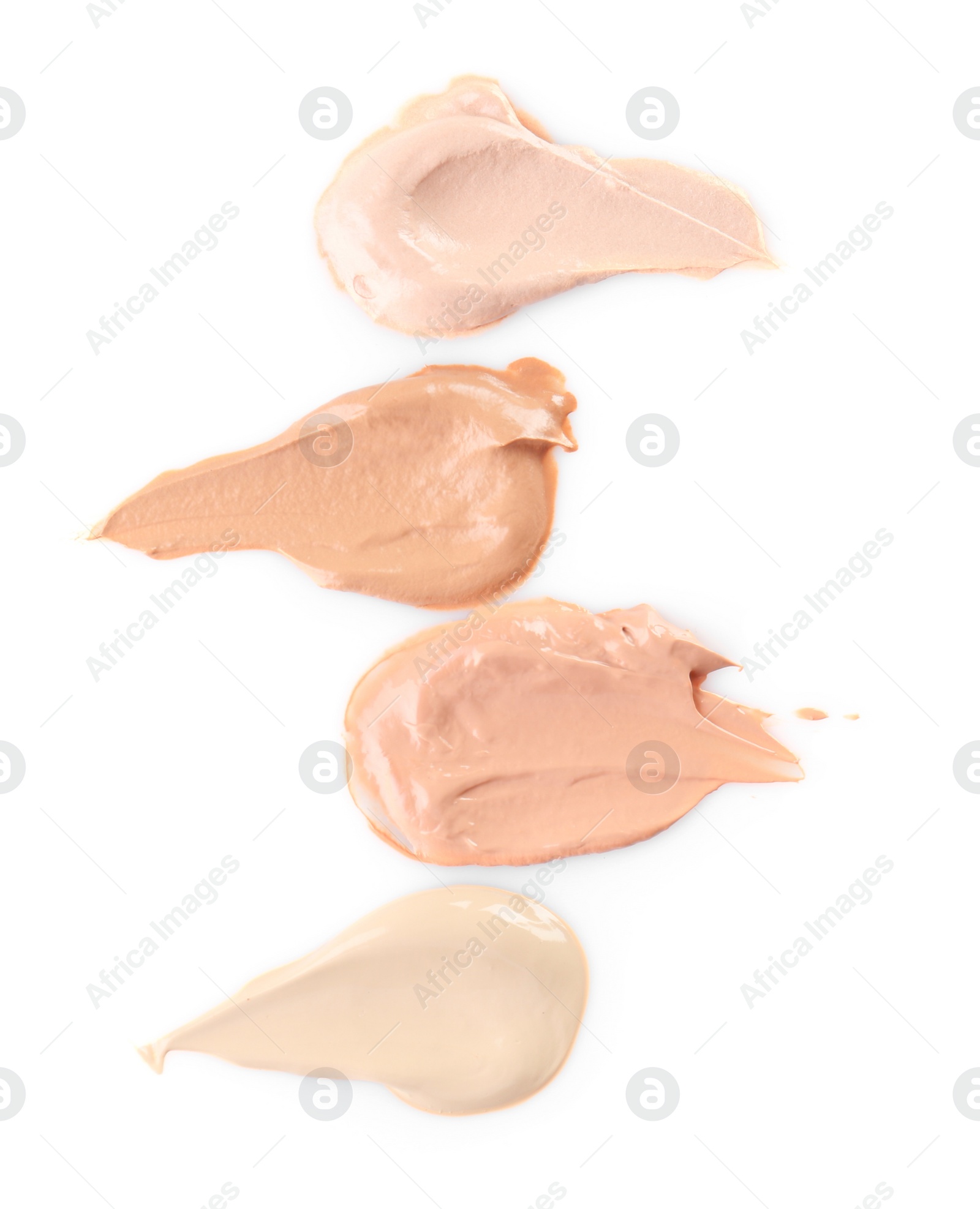 Photo of Liquid foundation on white background. Professional makeup products