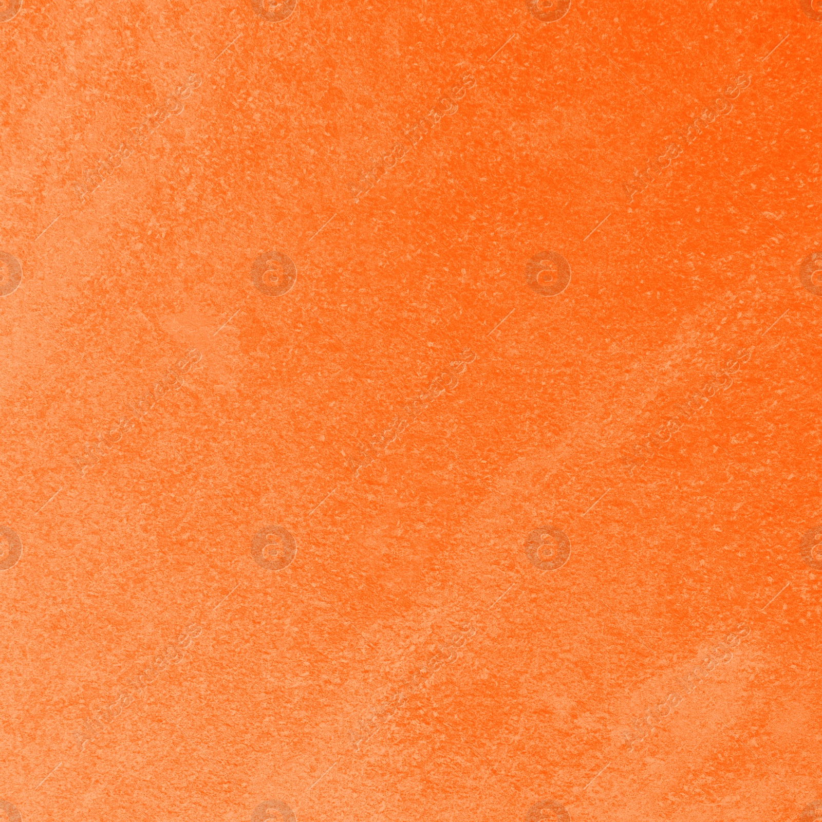 Image of Texture of concrete surface painted in orange color as background