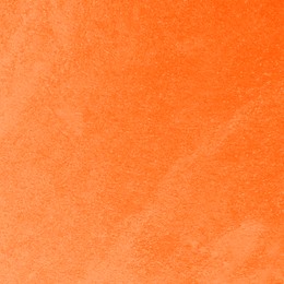 Texture of concrete surface painted in orange color as background