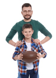 Photo of Little boy and his dad with ball on white background