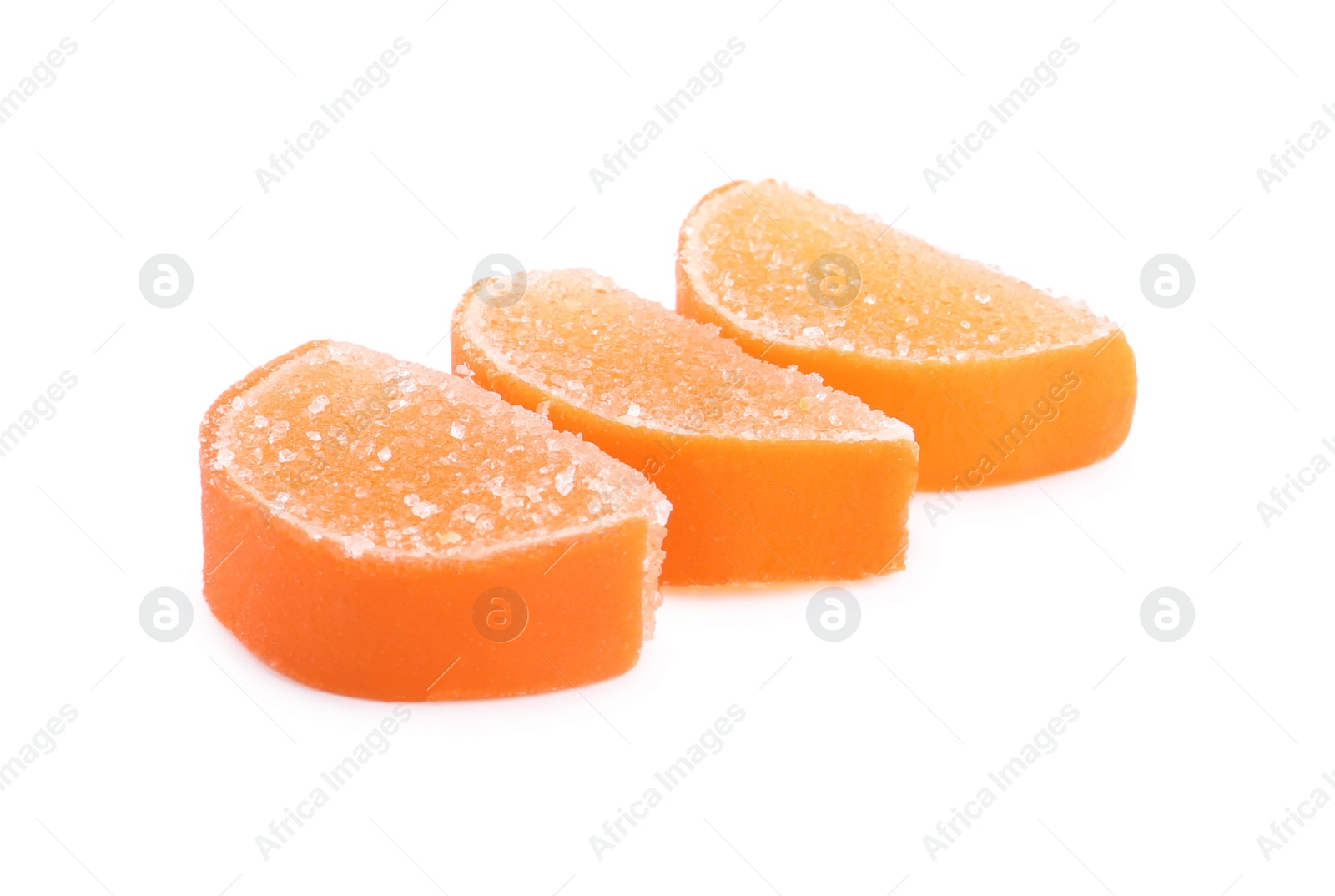 Photo of Sweet orange jelly candies on white background