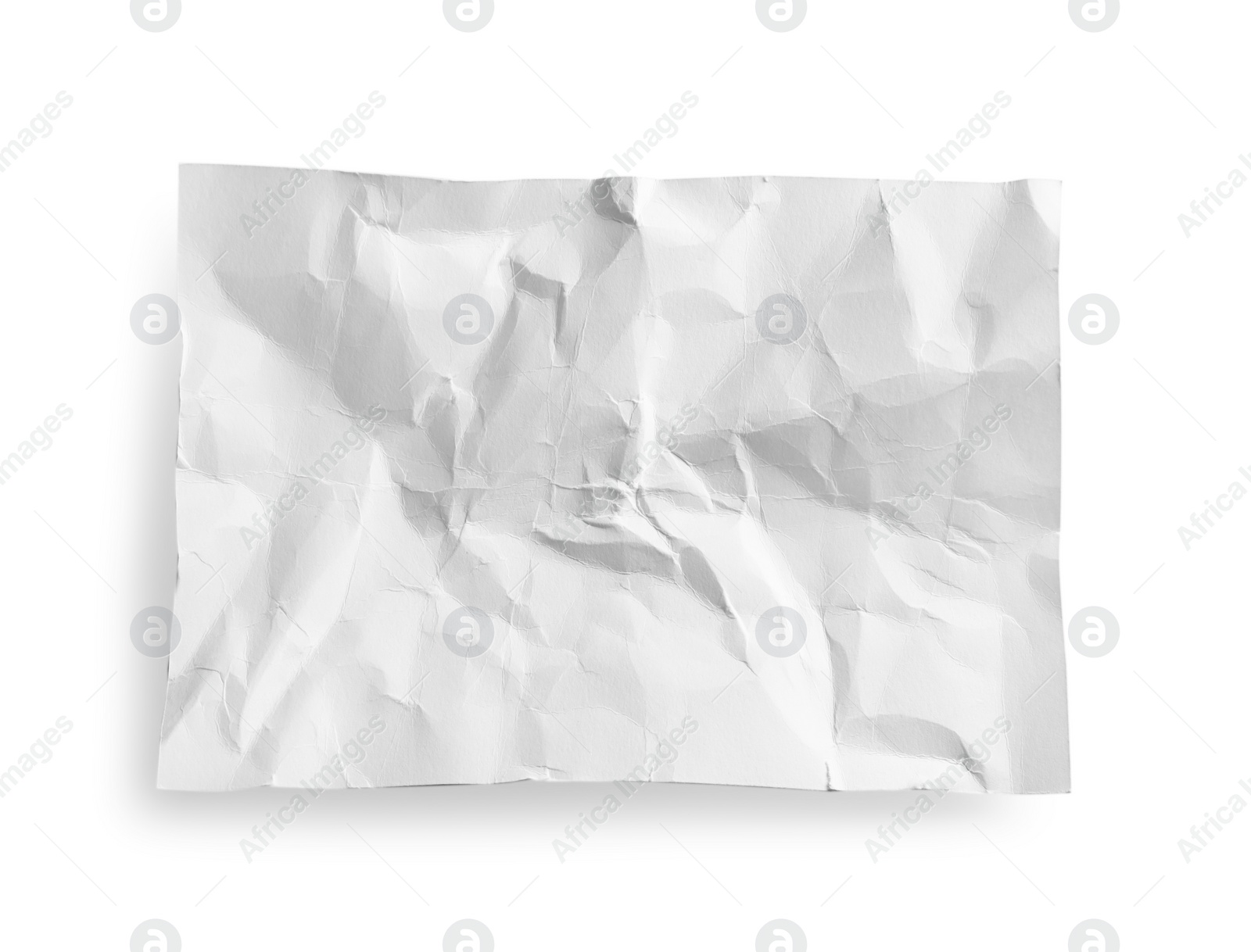 Photo of Crumpled paper sheet isolated on white, top view