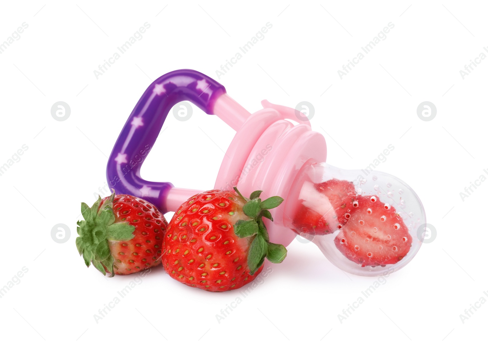 Photo of Nibbler with fresh strawberry on white background. Baby feeder