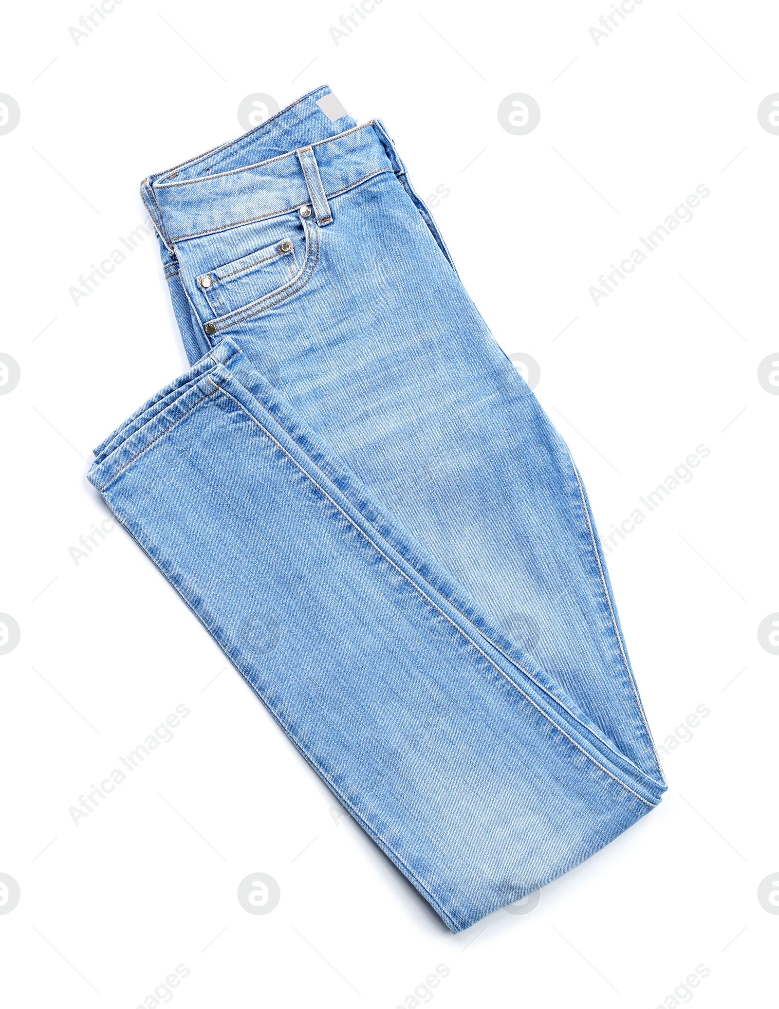 Photo of Stylish jeans on white background, top view