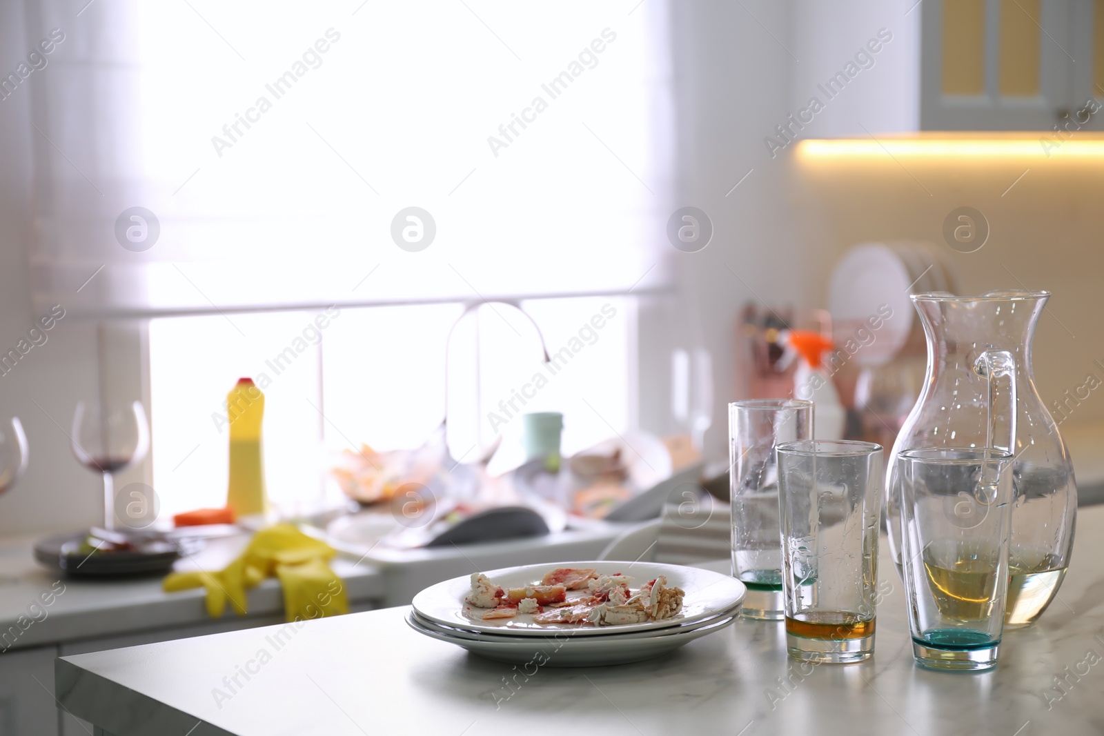 Photo of Dirty dishes in kitchen after new year party