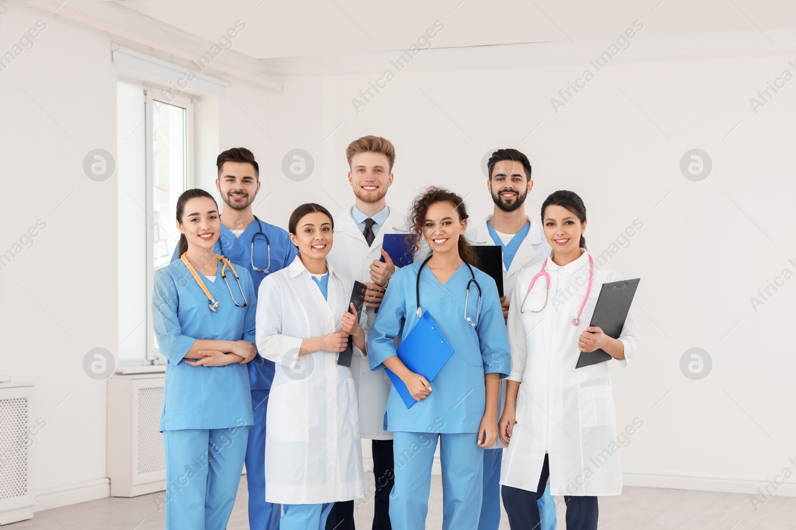 Photo of Team of medical workers in hospital. Unity concept