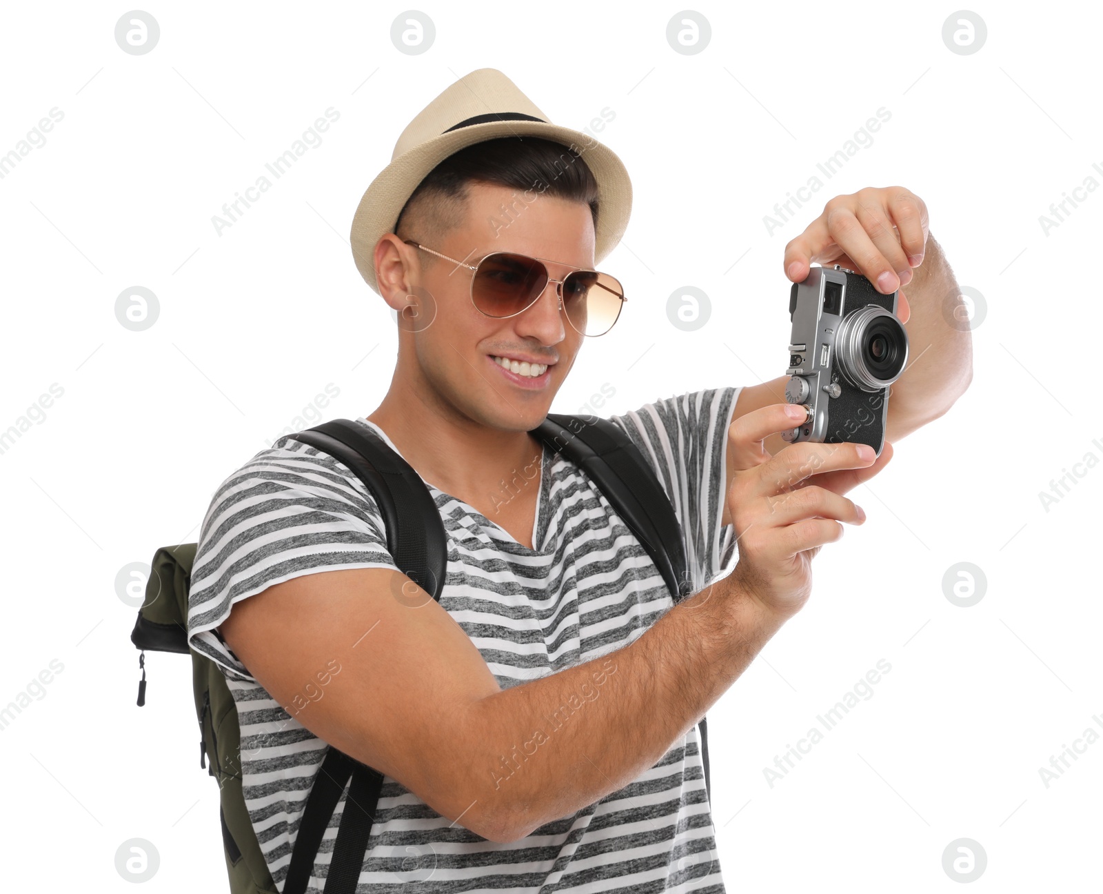 Photo of Man with straw hat taking picture on white background. Summer travel