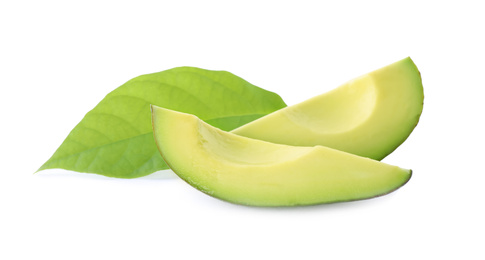 Slices of ripe avocado isolated on white