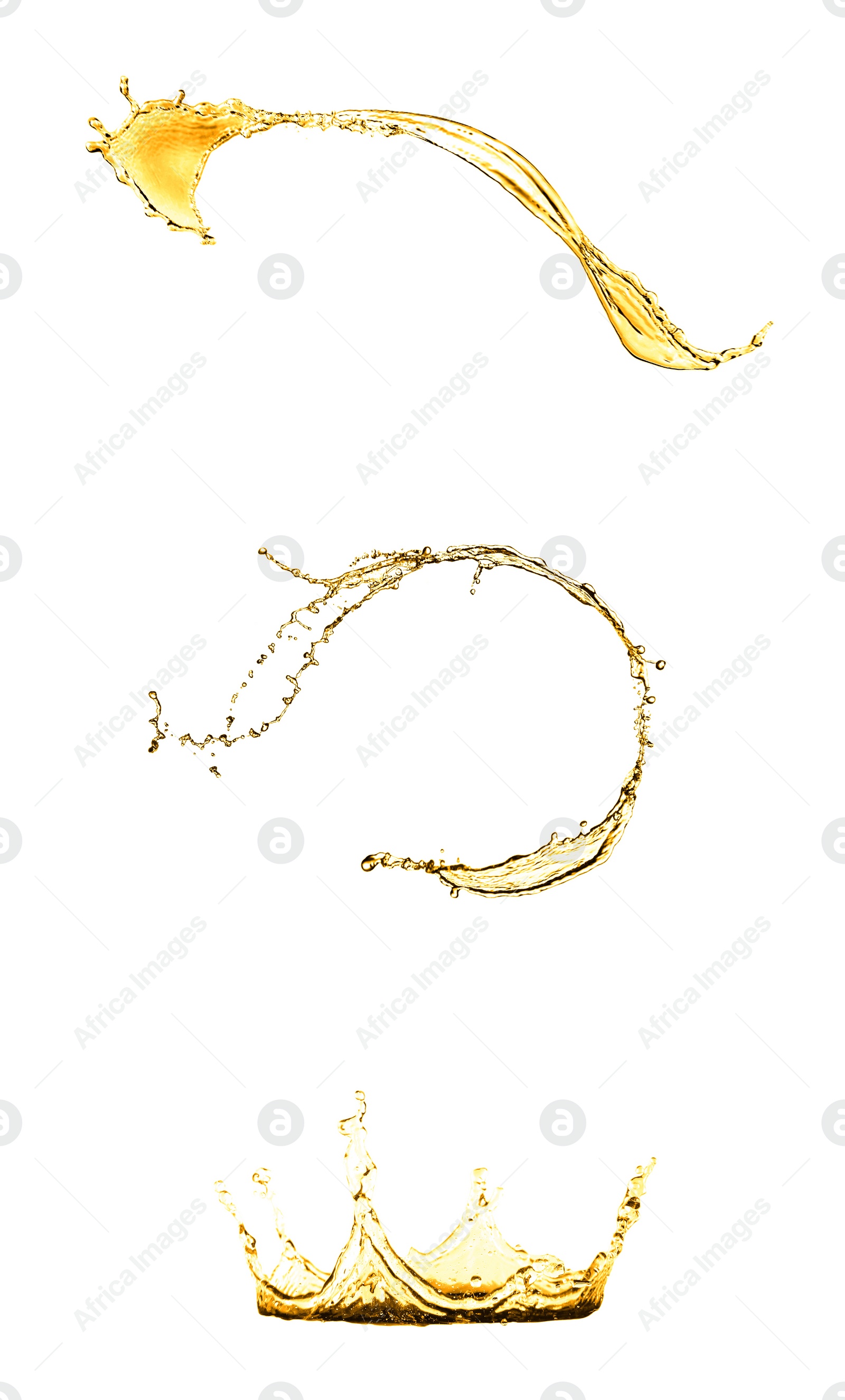 Image of Splashes of golden oily liquid on white background