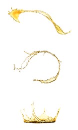 Splashes of golden oily liquid on white background