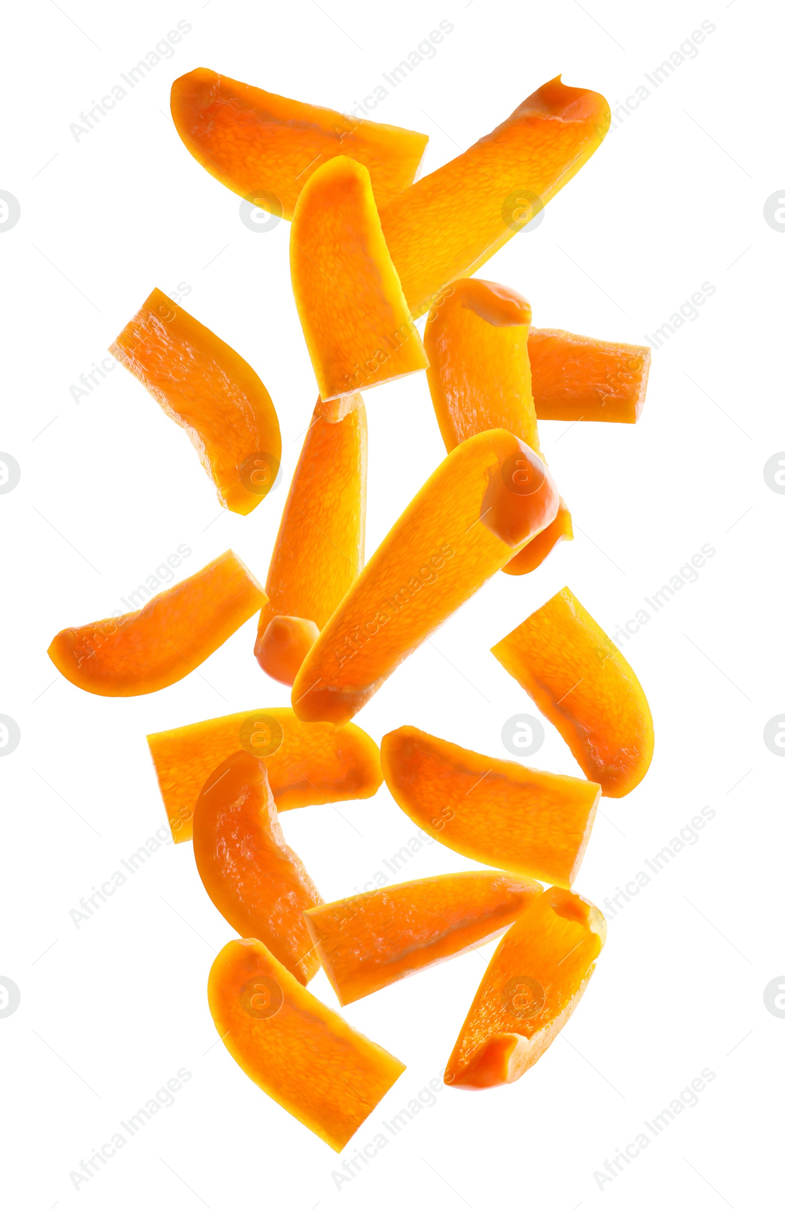 Image of Falling cut orange bell peppers on white background