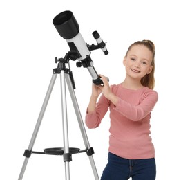 Happy little girl with telescope on white background