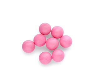 Bright pink chewy gumballs isolated on white