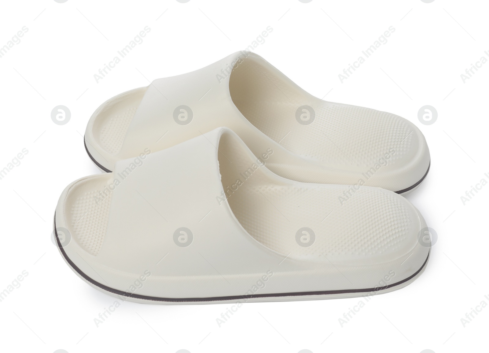 Photo of Pair of rubber slippers isolated on white