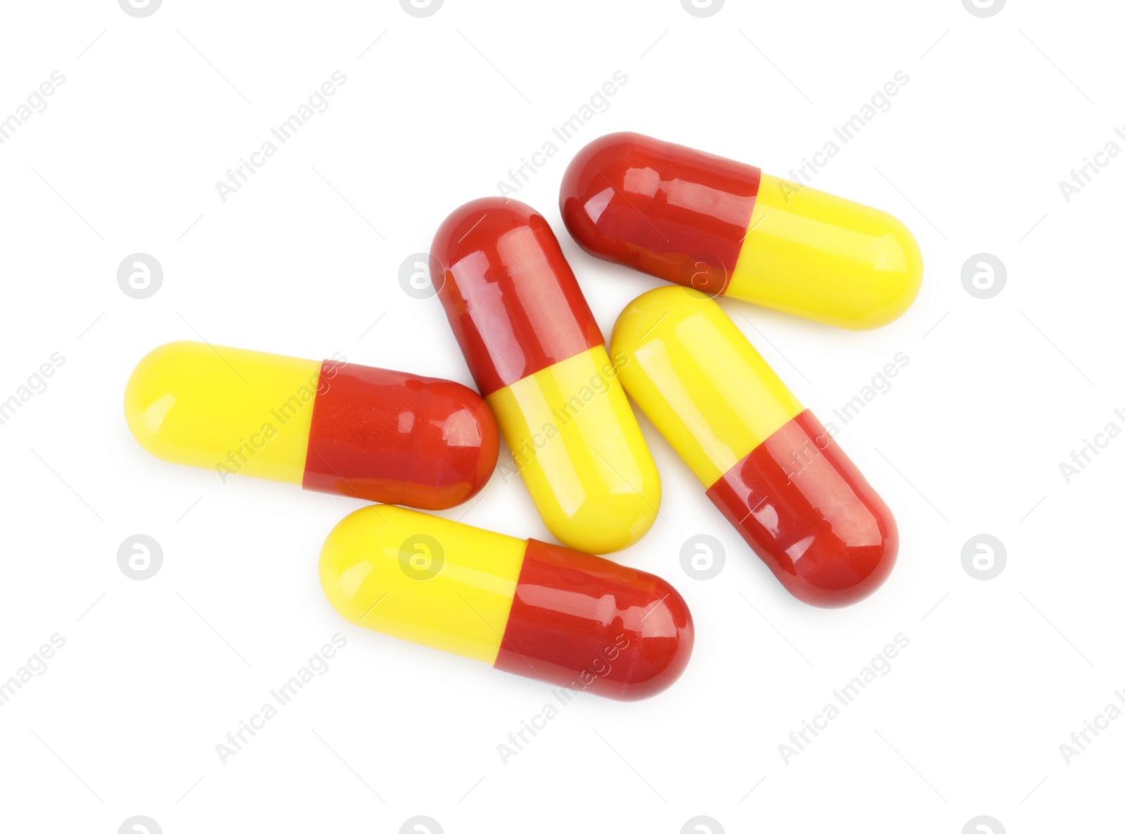 Photo of Many antibiotic pills isolated on white, top view