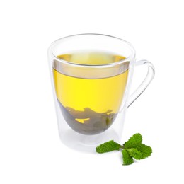 Fresh green tea in glass mug and mint isolated on white