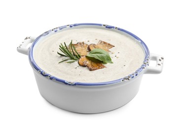 Fresh homemade mushroom soup in ceramic pot isolated on white