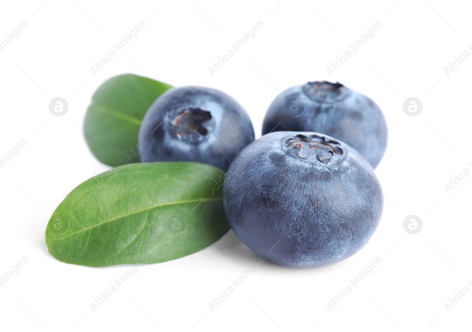 Photo of Fresh ripe blueberries with leaves on white background