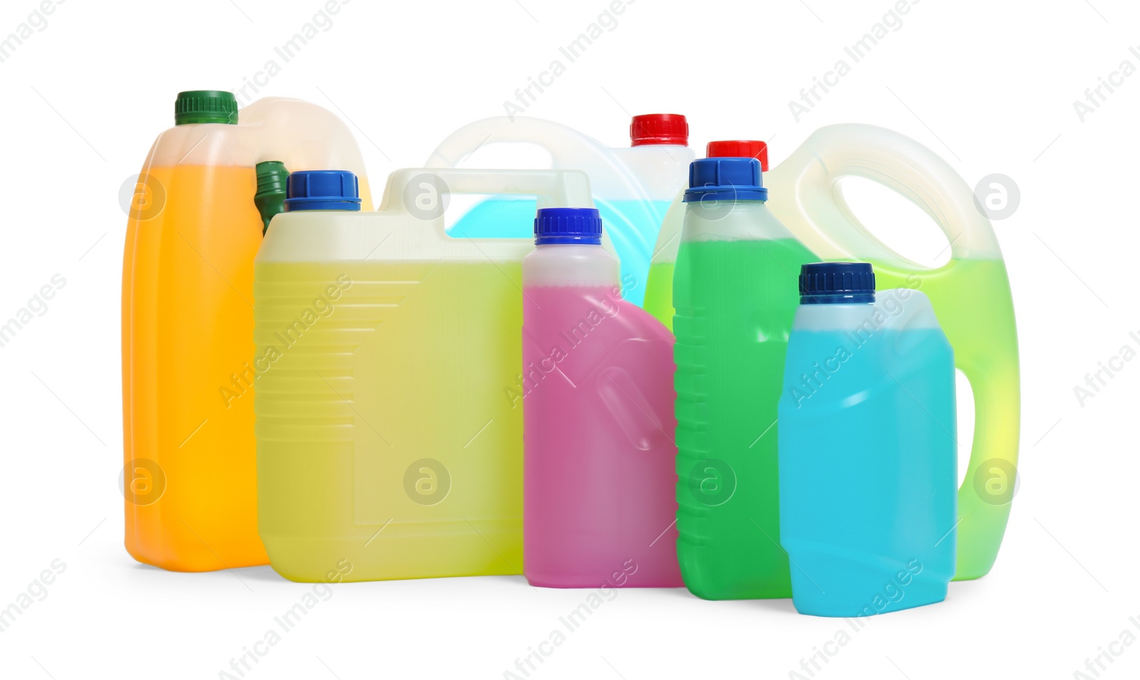 Photo of Plastic canisters with different liquids for car on white background