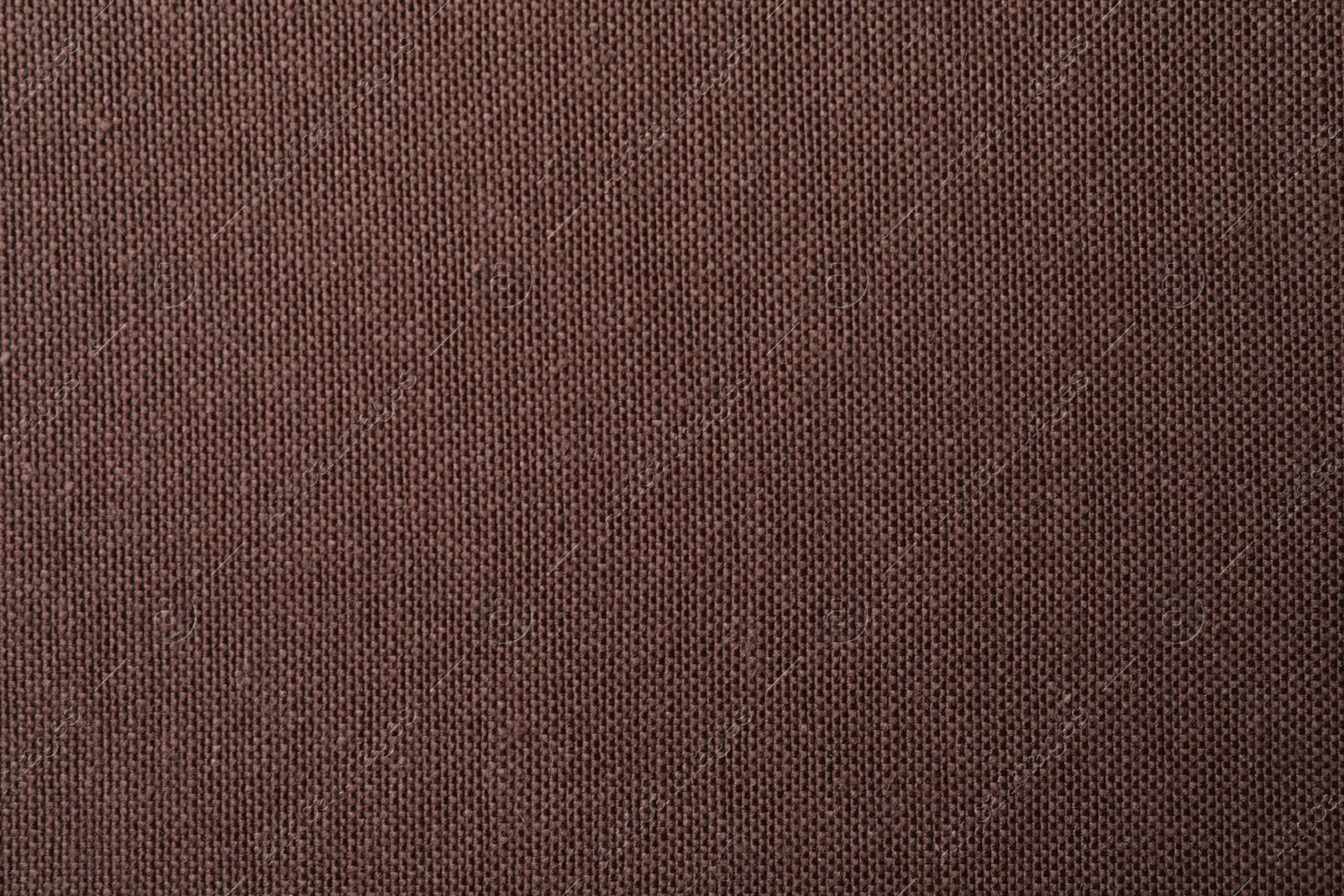 Photo of Texture of brown fabric as background, top view