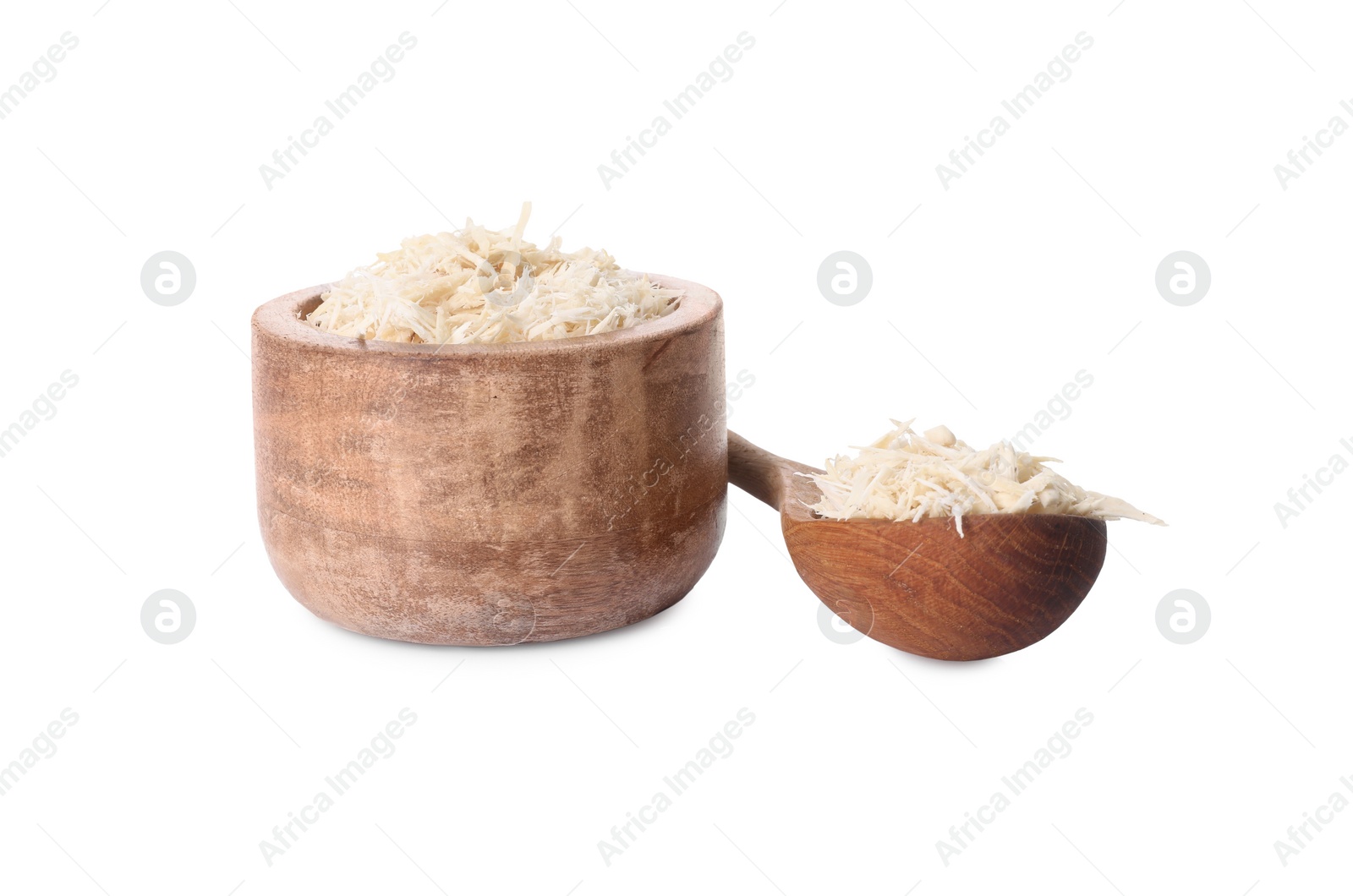 Photo of Grated horseradish in bowl and spoon isolated on white