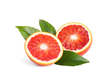 Photo of Cut ripe red orange with green leaves isolated on white