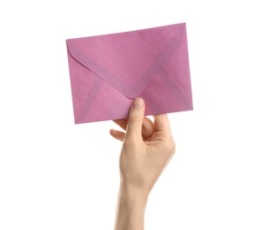 Woman holding pink paper envelope on white background, closeup