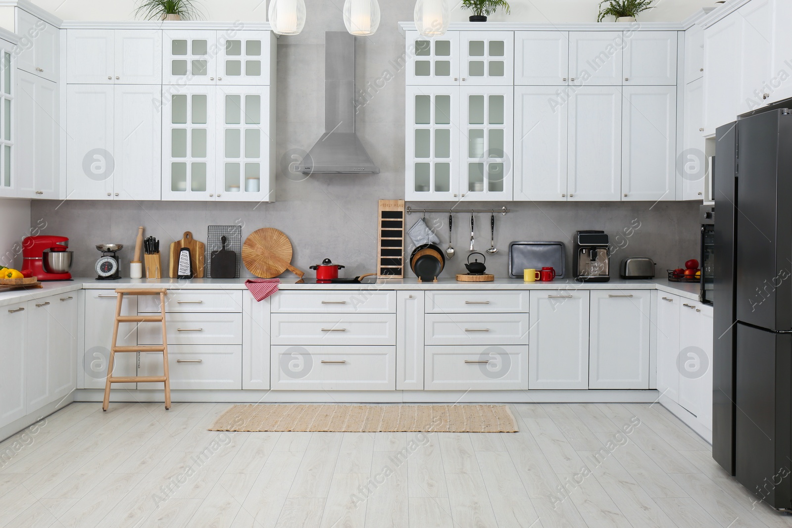 Photo of Beautiful kitchen interior with stylish modern furniture