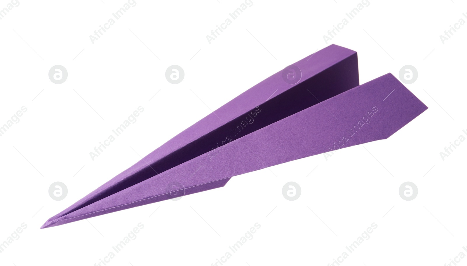 Photo of Handmade purple paper plane isolated on white