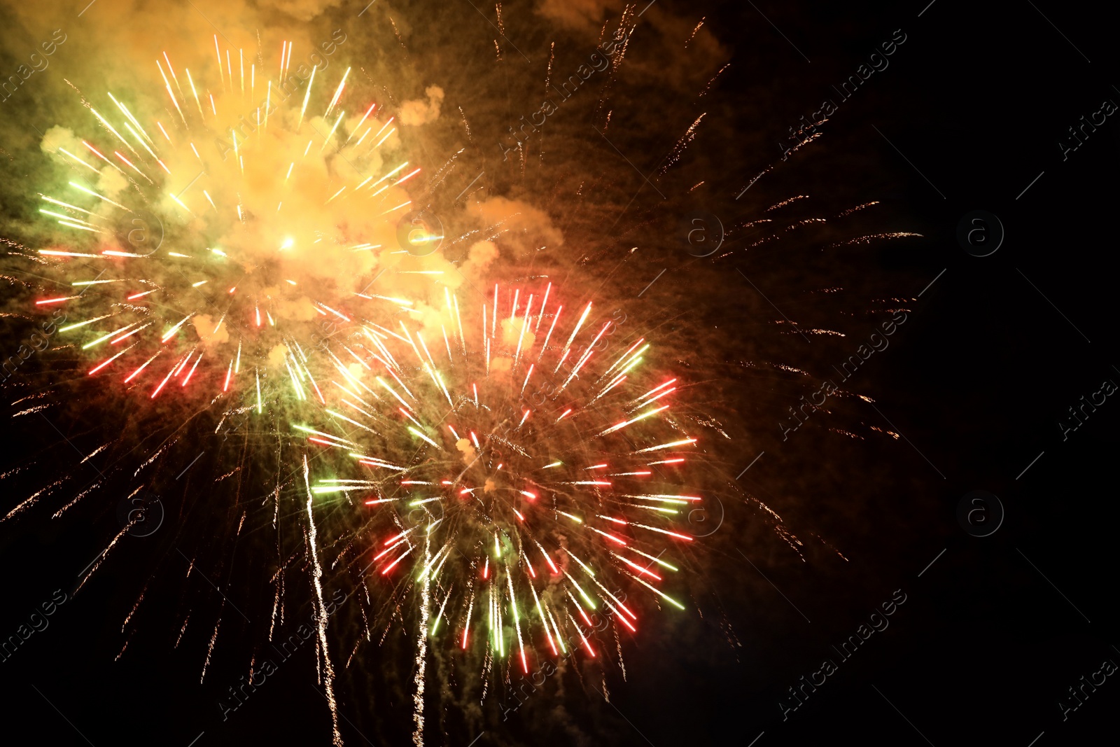 Photo of Beautiful bright firework lighting up night sky